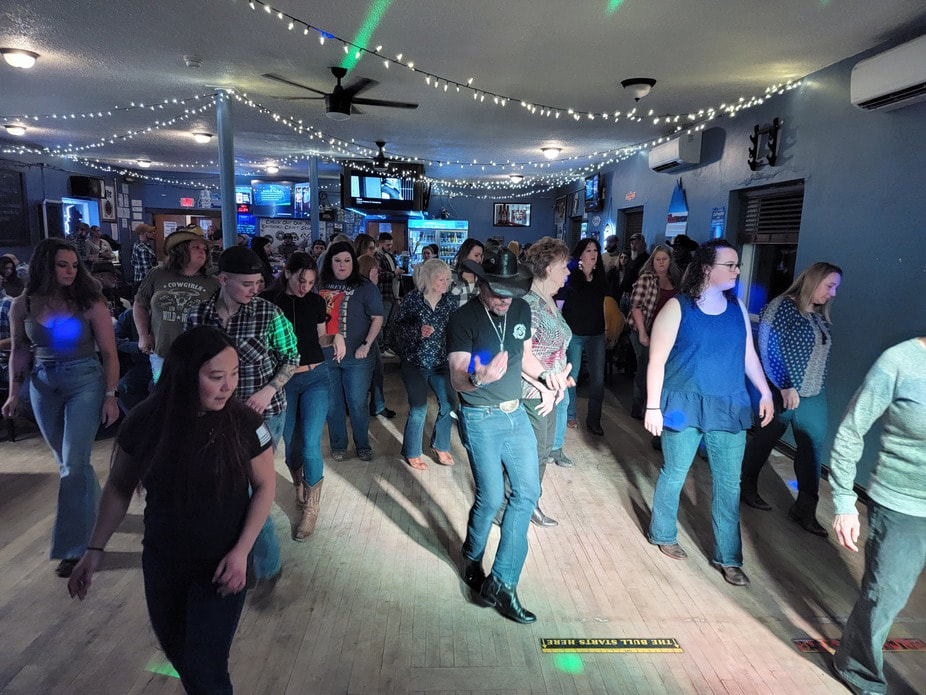 Picture of Line Dancing at Rough Cut Tavern on Dance Floor during DJ Music Night